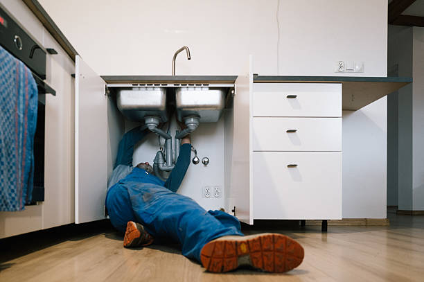 Professional Plumbing technician working in Clinton, MS